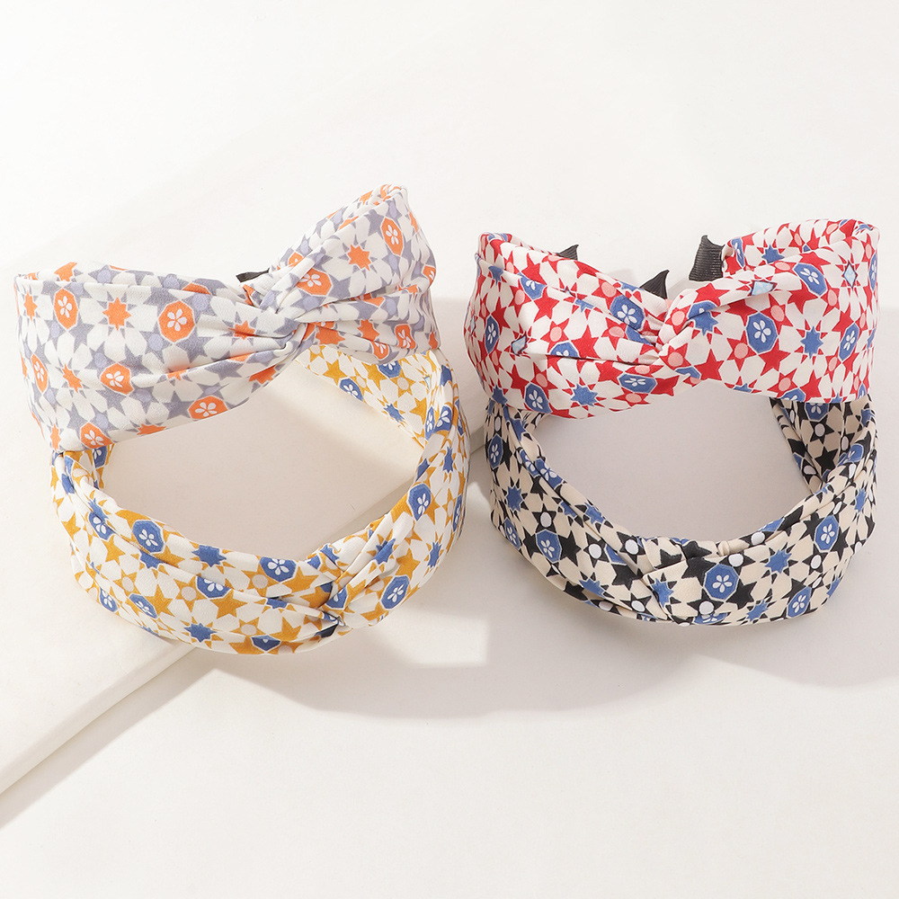 Korean Style Floral Printed Fabric Cross-knotted Headband Wholesale Nihaojewelry display picture 1