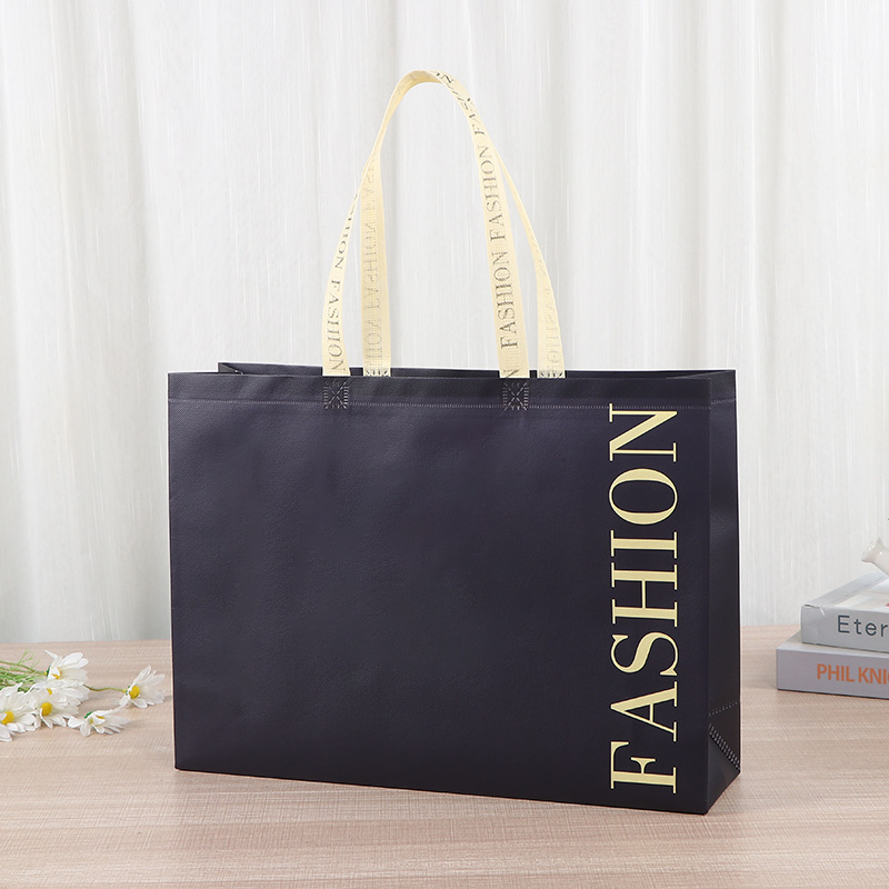 Bolsa de mano no tejida multi-especificación plegable con regalo de mano bolsas de compras de mano logotipo impresa en color bolsas de tela no tejida