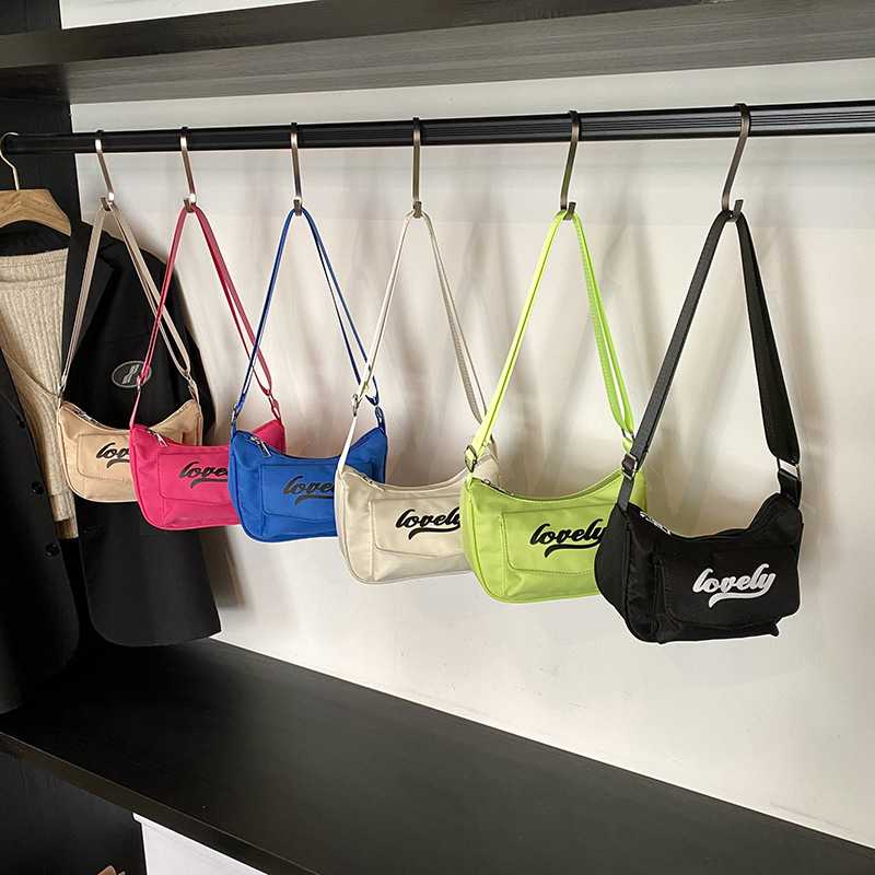 Versión coreana del bolso de hombro para niños y niñas de moda, letras de estilo occidental, deportes de ocio, bolso de mensajero para niños, nuevo monedero para niños