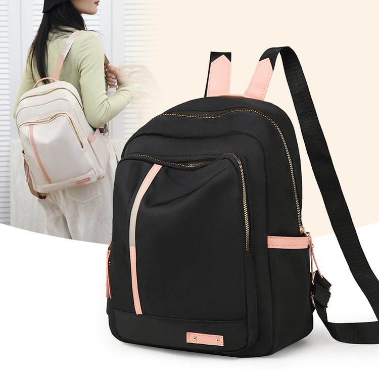 Nueva mochila de tela Oxford para mujer, versión coreana de gran capacidad, mochila de estilo universitario salvaje, bolsa de viaje ligera impermeable