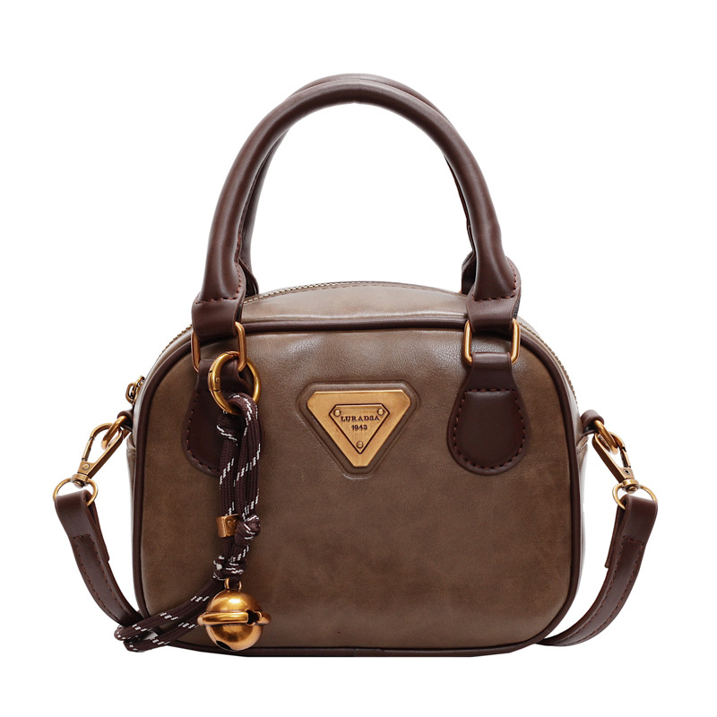 Diseño de nicho transfronterizo retro bolso pequeño para mujeres 2024 nueva moda de otoño y invierno simple bolso de hombro portátil