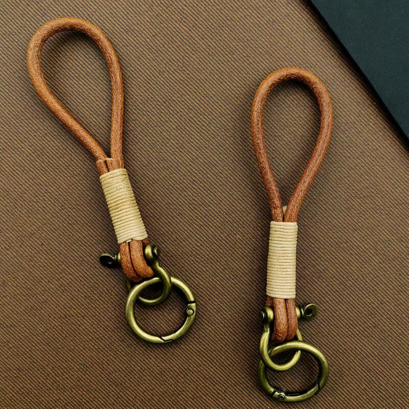 Super hot handmade alkaline water knot bread leather rope keychain vintage car genuine leather rope spring key ring wholesale Super hot handmade alkaline water knot bread leather rope keychain vintage car genuine leather rope spring key ring wholesale