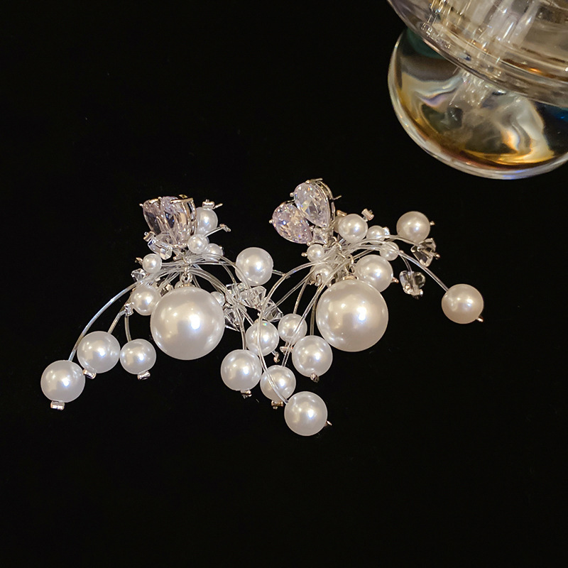 Aguja de plata-plata