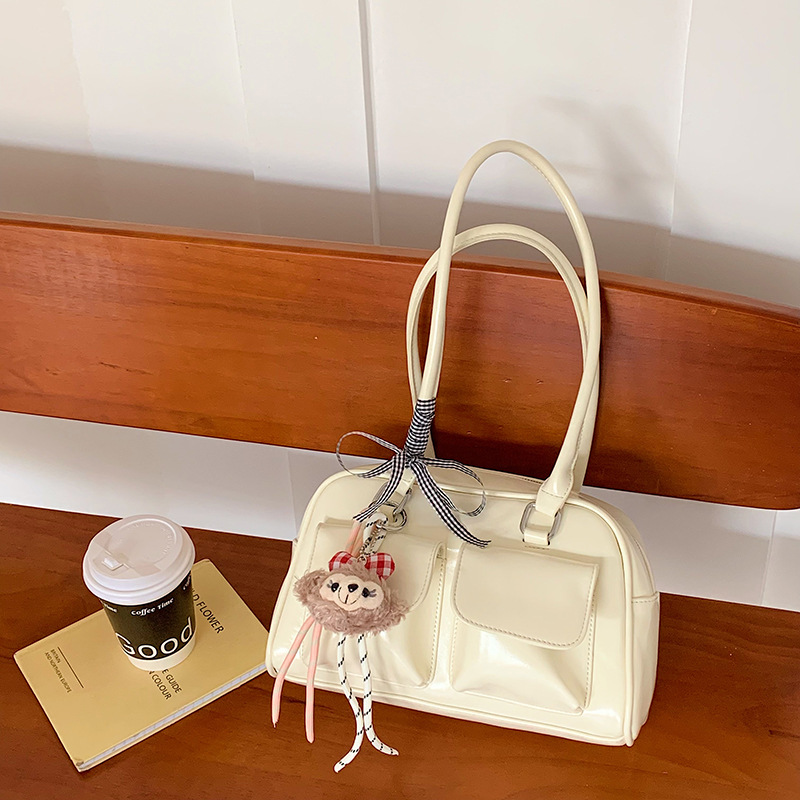 La moda coreana de nicho de estilo extranjero bolsas de palos debajo de las axilas para mujeres 2026 primavera nueva bolsa diaria de Boston bolsas de bolos