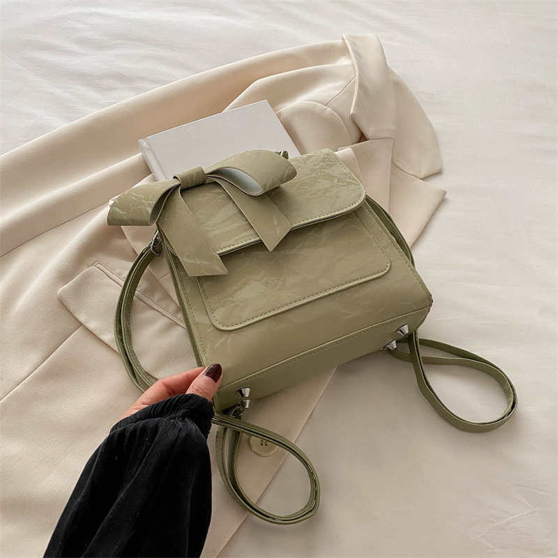 Mochila de hombro de arco para mujeres 2024 nueva moda estilo académico mochila de estilo universal bolso de mano bolso de viaje