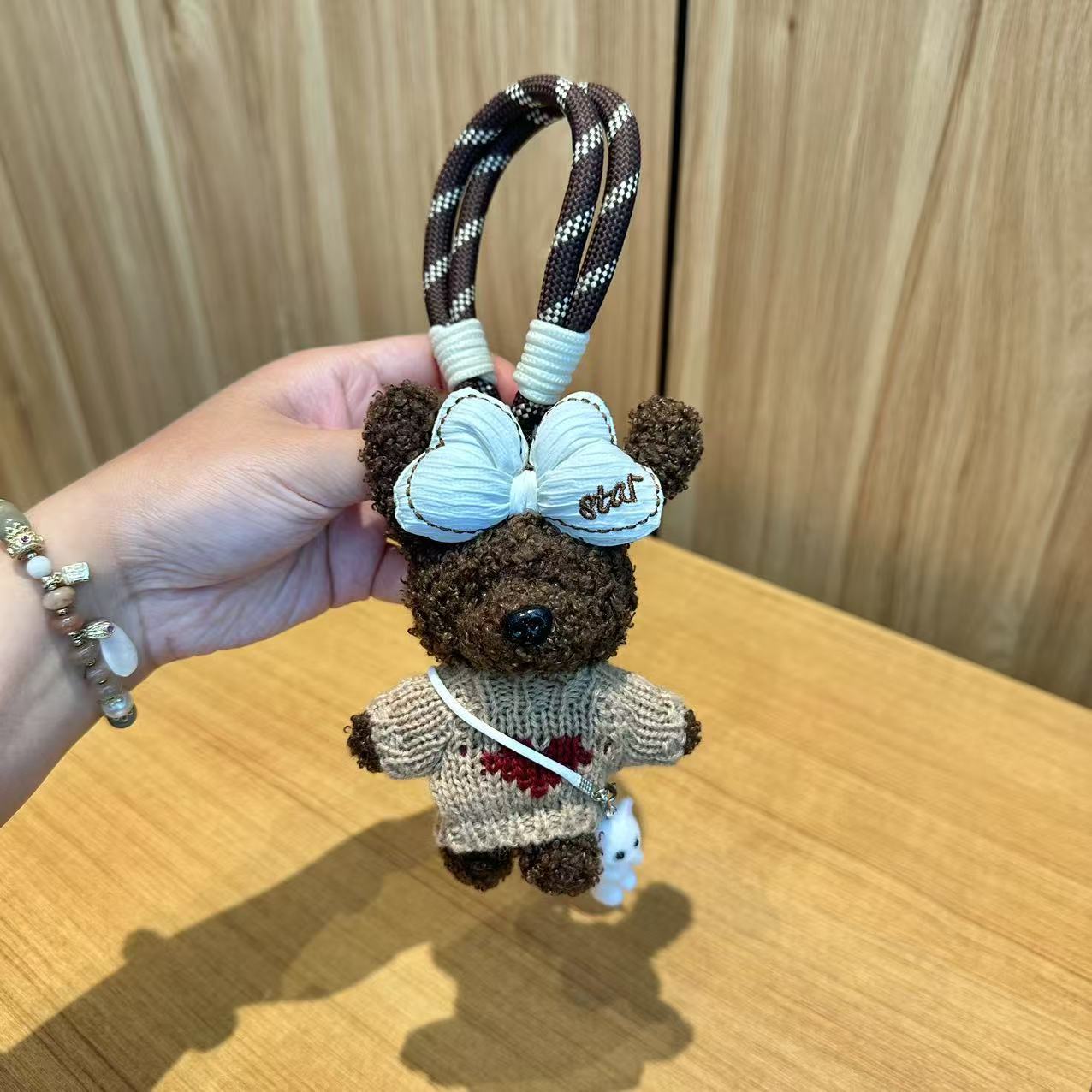 Coreano de color cuerdas de peluche osos colgantes juguetes hechos a mano bolsos muñecas colgantes muñecas colgantes teléfonos móviles viento dulce y fresco