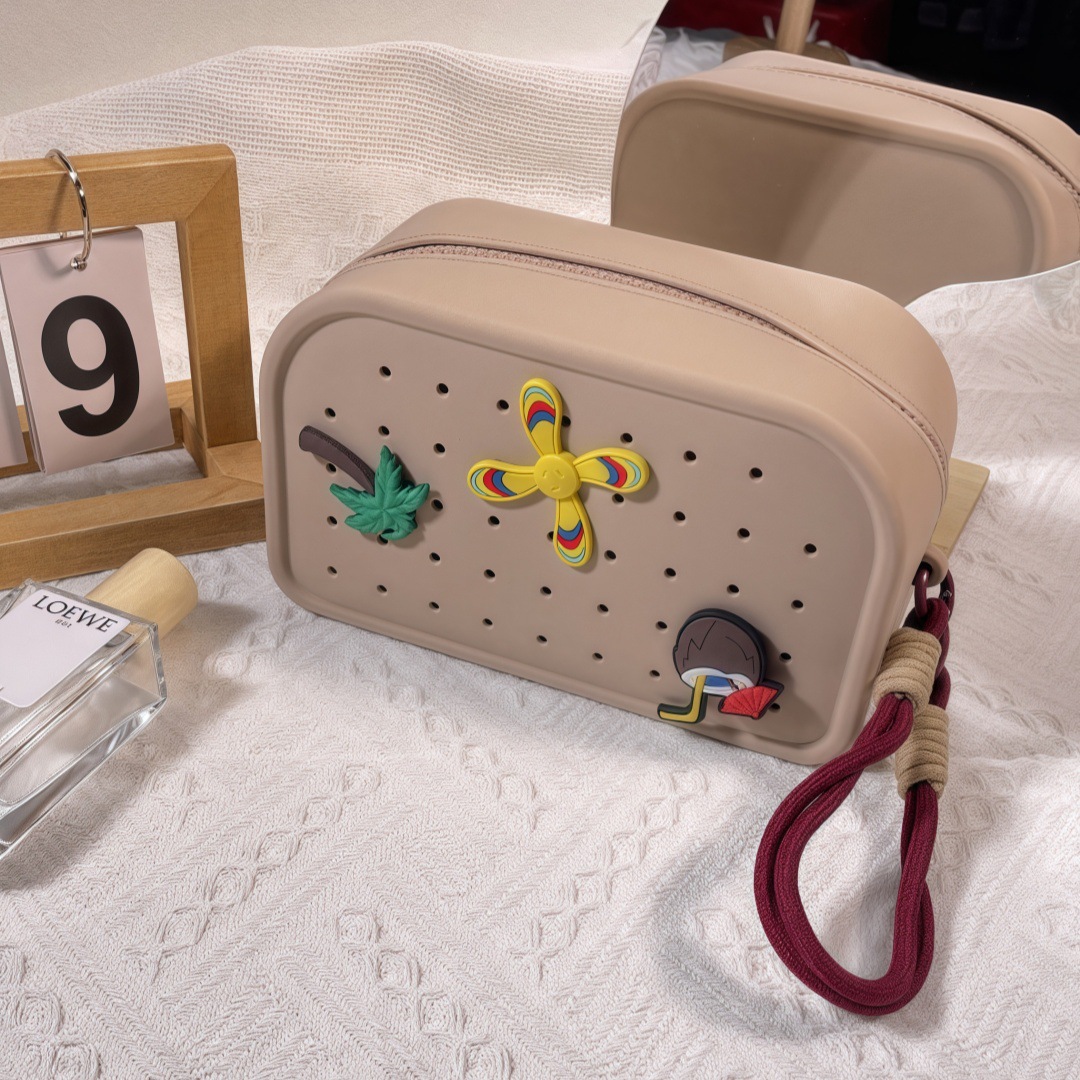 Nueva bolsa de silicona agujero portátil bolsa de silicona agujero adorable INS versión de agujero agujero bolsa de silicona DIY pieza bolsa de silicona