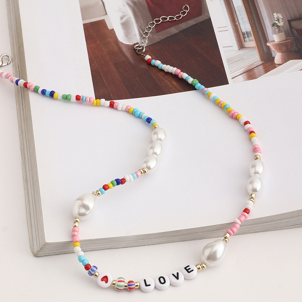 Ethnic Stacked Letter Pearl Beaded Multi-layer Necklace display picture 6