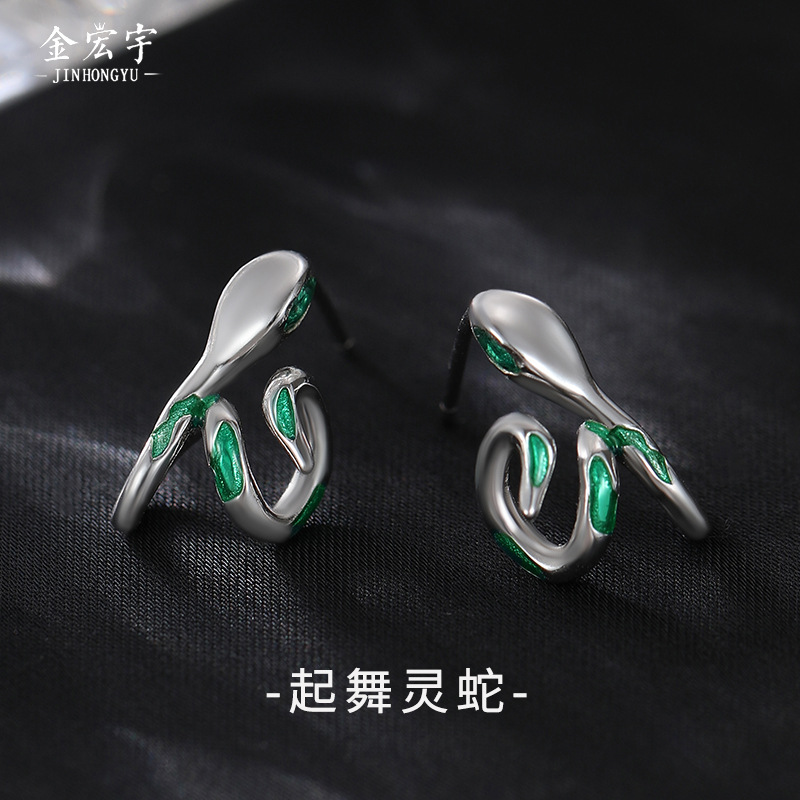 Small design brand earrings with zircon