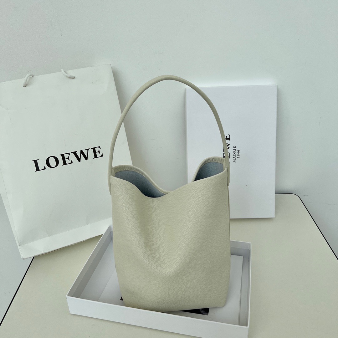 牛革トートバッグ女性のための 2025 新しいシングルショルダー大容量ショッピングバッグカジュアル怠惰なスタイル脇の下バッグ通勤バッグ