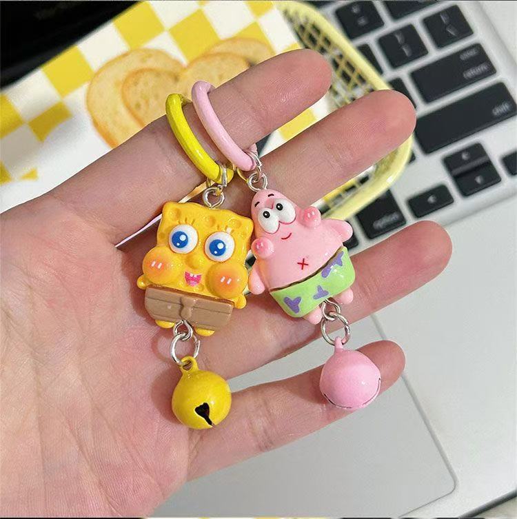Bob Esponja Pi Estrella pareja encantadora campana de dibujos animados colgante niña accesorios bolsas escolares estudiantes amigos
