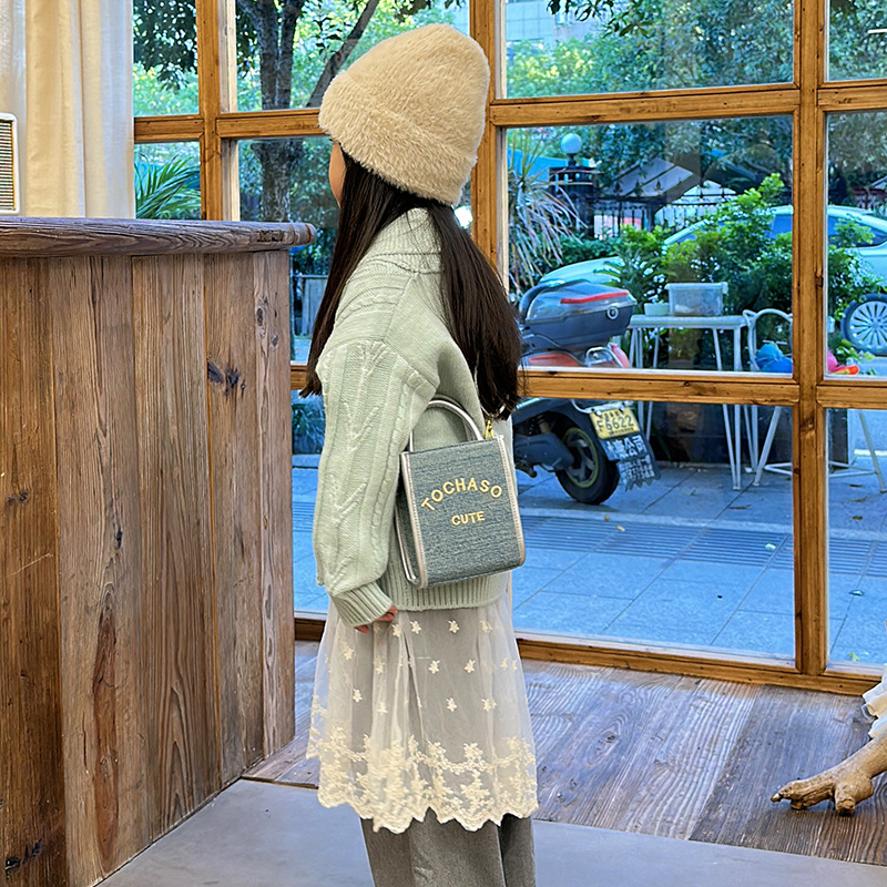 Bolsas de estilo coreano para niños y niñas letras extranjeras estilo mini bolsas de mochila para bebés 2025 nuevas bolsas de comercio exterior para niños