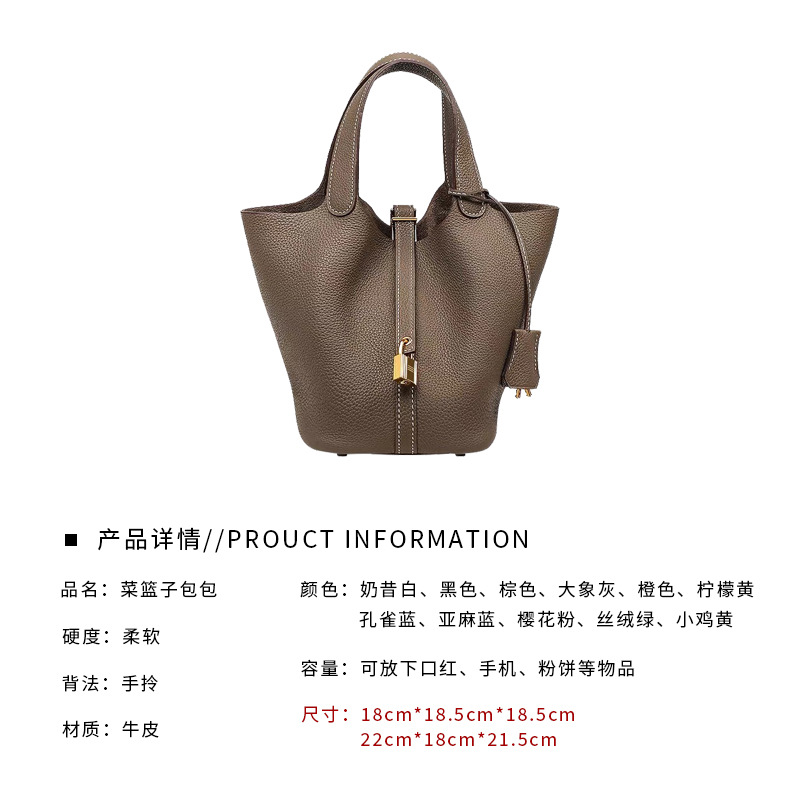 2022 nuevo color a juego bolsa de cesta de verduras bolso de cubo de piel de vaca patrón de Litchi primera capa de piel de vaca simple bolso portátil de mujer