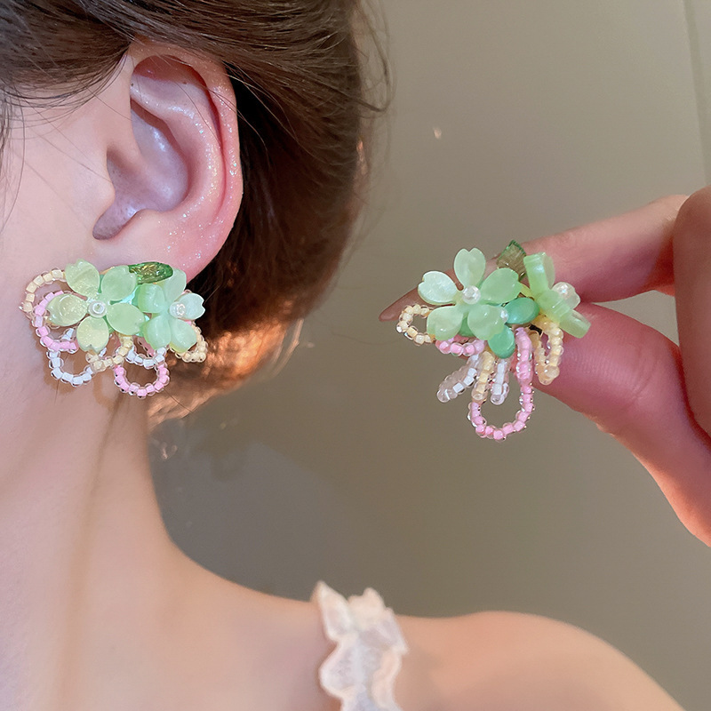 Pendientes de borla de flor de súper hada de plata Pendientes de ins pequeños frescos y dulces Personalidad de moda Pendientes de alta gama al por mayor