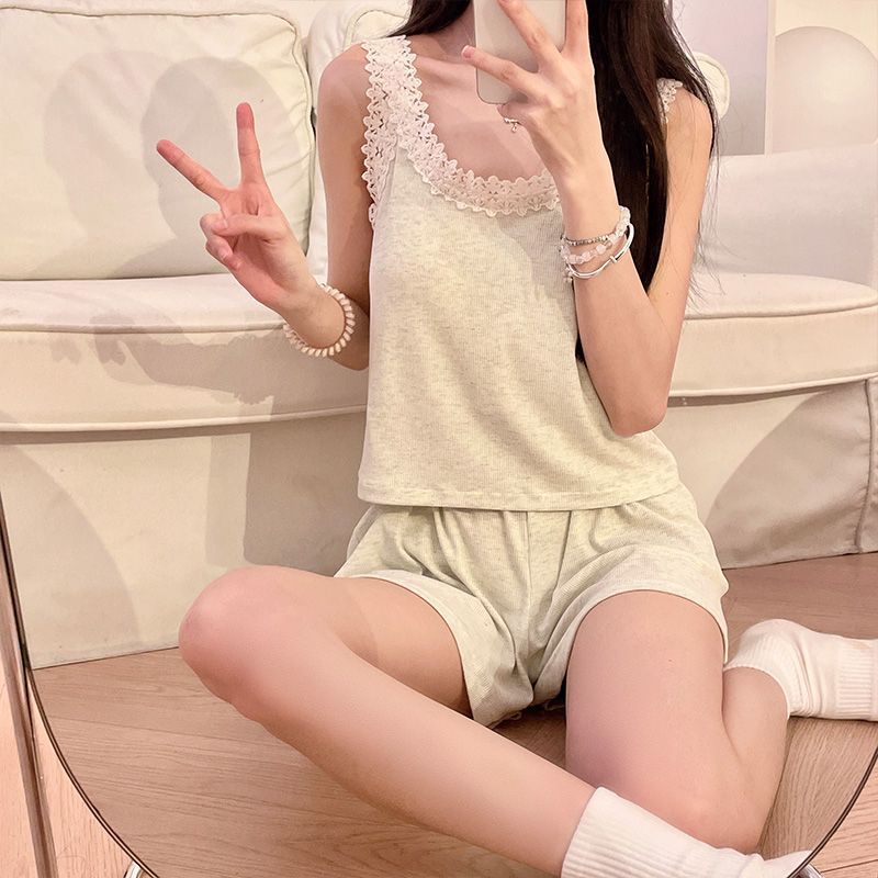 Pijamas de verano al por mayor transfronterizos para mujer, color sólido, simple con almohadilla para el pecho, encaje de tela con cremallera acanalada, traje de servicio a domicilio
