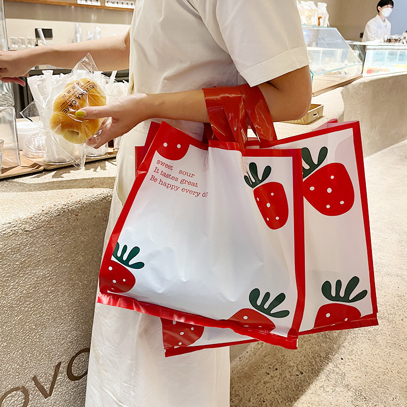 草莓童装服装店衣服用礼品塑料包装购物手提袋子批发打包可印logo