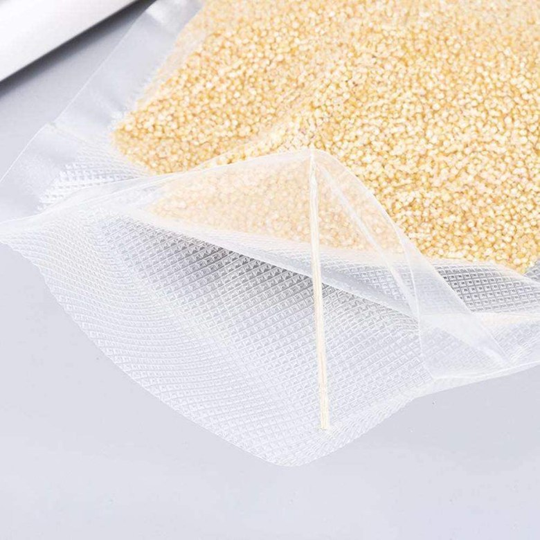 Bolsa de vacío de grano grueso transparente malla de alimentos cocidos bolsa de compresión de siete capas bolsa de coextrusión suministro directo de fábrica en stock