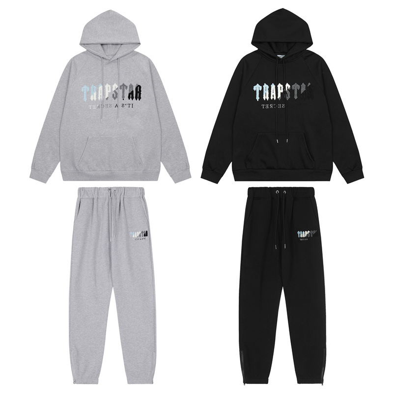 Trapstar marca de moda europea y americana azul, blanco, gris y negro bordado toalla forrado de lana hombres y mujeres pareja de alta calle traje de ocio