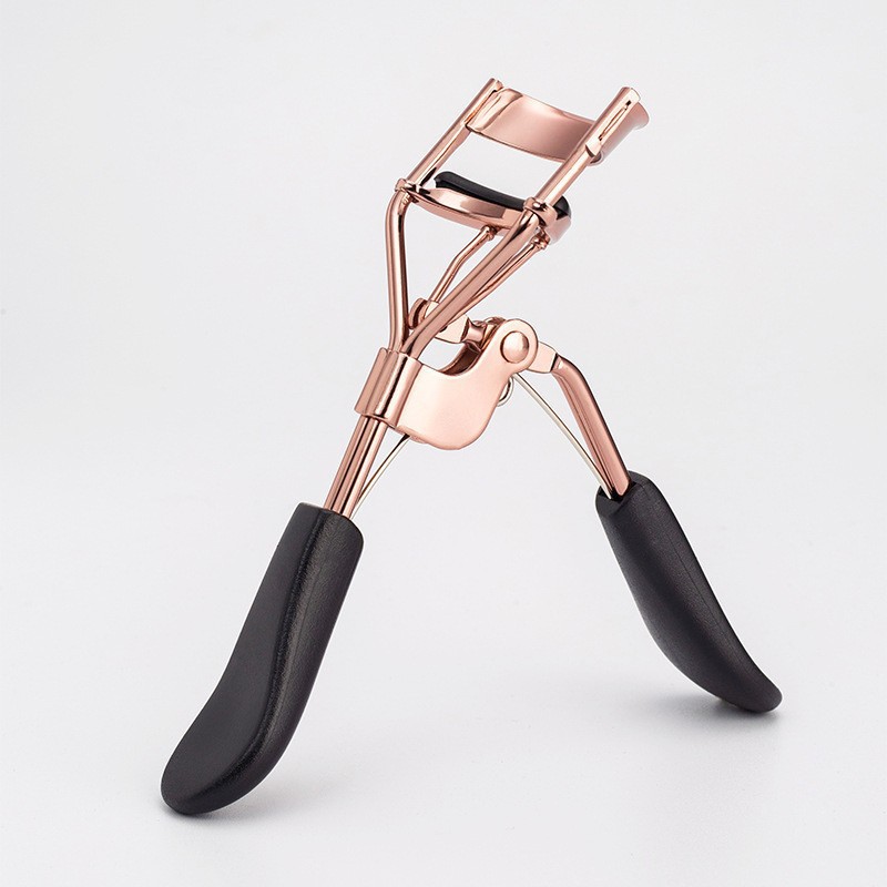 Golden curling eyelash curler contains rose solar-powered