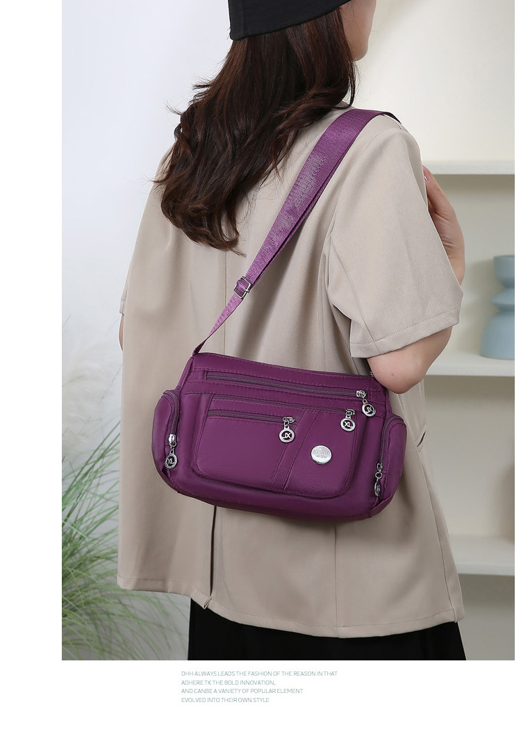 A new popular women's crossbody bag with multiple layers made of Oxford fabric, fashionable, casual and trendy. It's a single-shoulder bag for middle-aged and elderly mothers undefined