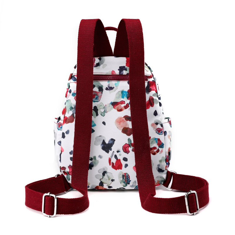 Nuevo estilo coreano mochila de mujer de moda de mediana edad y anciano madre viaje pequeña mochila de nylon mochila casual al por mayor