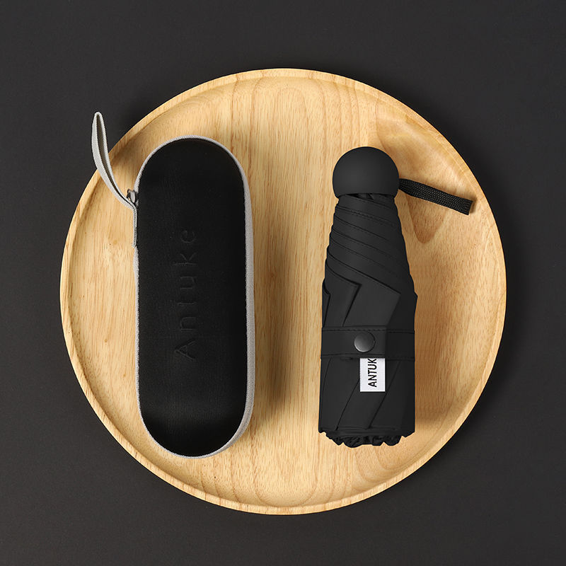 Paraguas de cinco pliegues, negro, protector solar, sombrilla ultraligera, cápsula plegable, sombrilla, sombrilla de bolsillo, sombrilla publicitaria, venta al por mayor personalizada