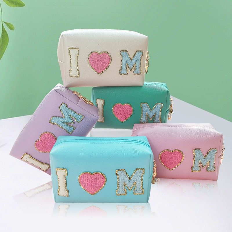 Liquidación de temporada: 60% de descuento en bolsas de maquillaje con letras bordadas de alto valor, estilo ins, pequeñas y portátiles.