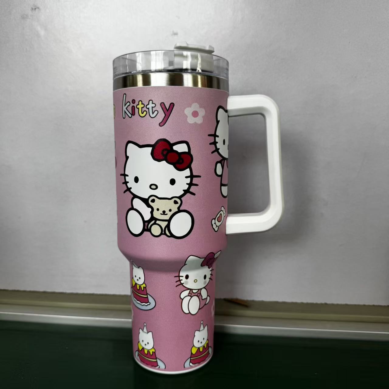 Transfronterizo Amazon 40oz Sanrio dibujos animados KT gato serie termo taza de hielo taza de café portátil con mango