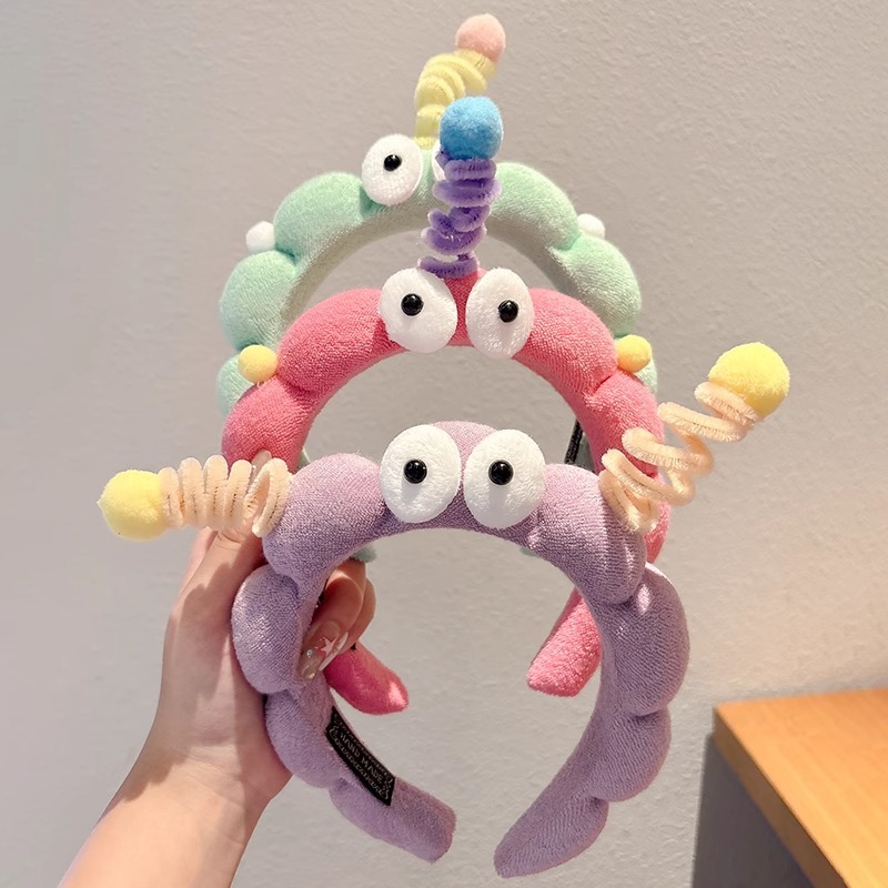 Hermosos ojos grandes torsión varilla esponja banda de cabello para mujeres creativa extraña banda de cabello antideslizante tocado de lavado de cara broca de cabello