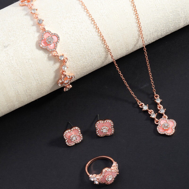 Hot-Selling Popular Item: Diamond-Encrusted Four-Leaf Clover Pink Bracelet, Necklace, Earrings, and Ring Set, Niche High-End Light Luxury Women's Style