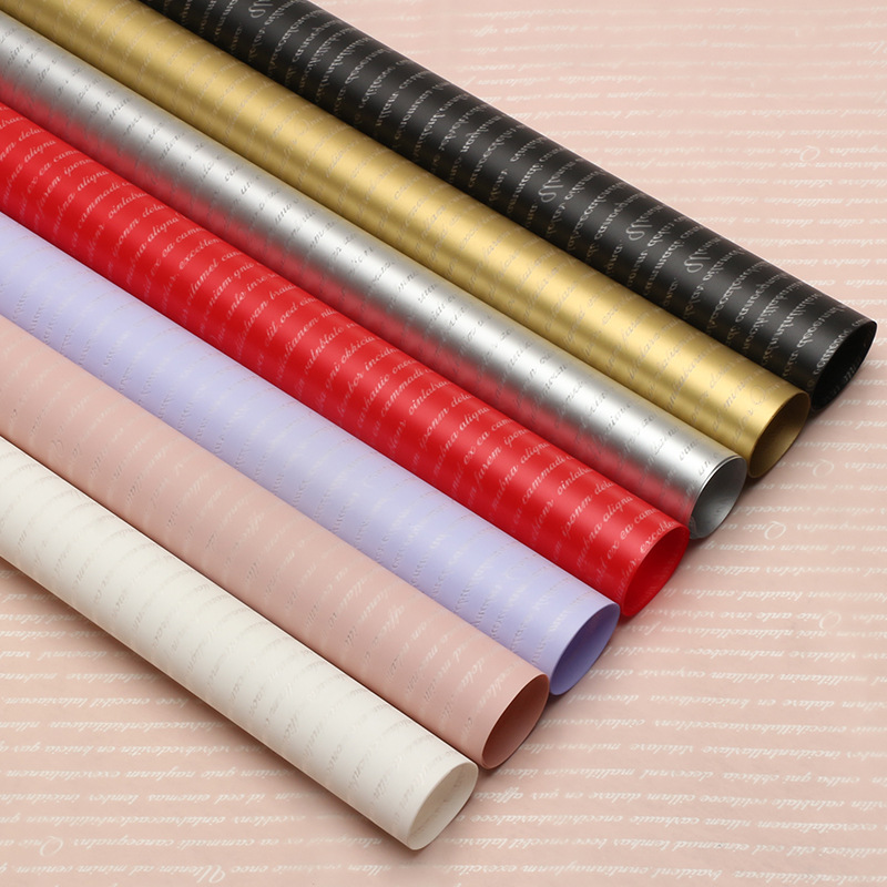 Huaxi pequeño inglés papel hansu flor al por mayor papel de embalaje ramo material de embalaje impermeable niebla material de florista