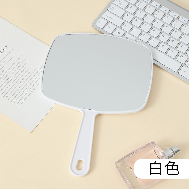 Espejo de maquillaje portátil de gran tamaño multifuncional colgante color sólido HD belleza mango espejo fábrica al por mayor