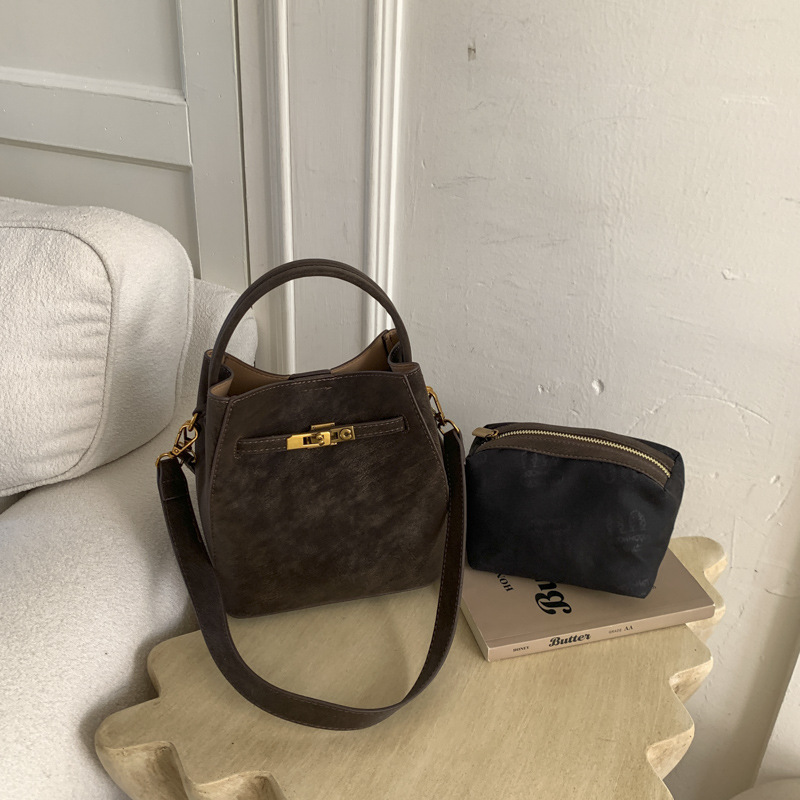 Super caliente canasta de platos de mano bolso de cubo de agua mujer venta caliente transfronteriza nuevo nicho coreano alto sentido versátil bolso mochila