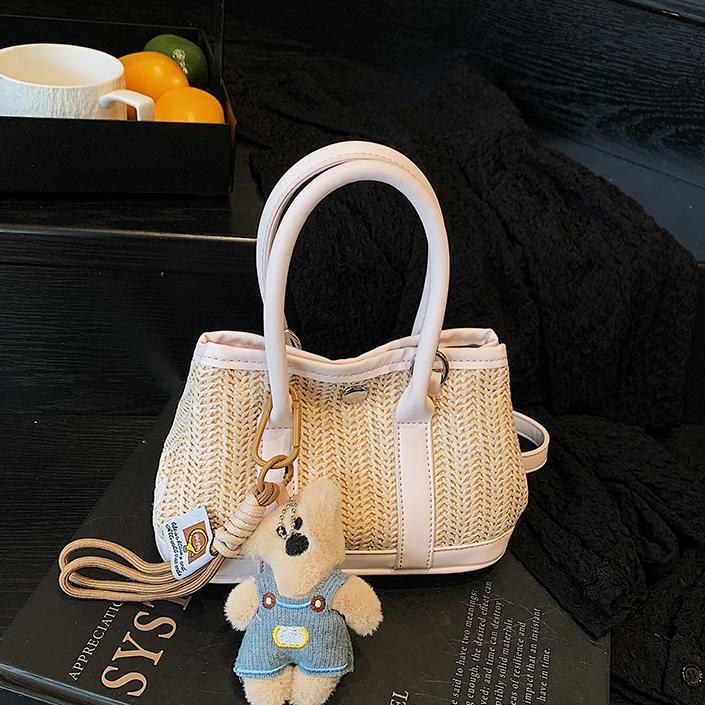 2025 verano nuevo bolso bolso de paja portátil de moda versátil para mujer
