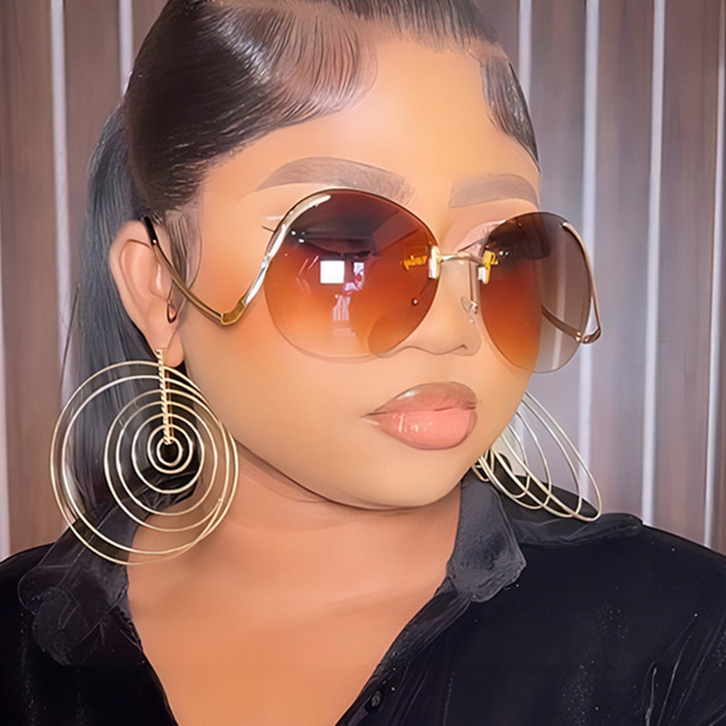 45g Weight Frameless Glasses Structure Sunglasses Classification PC, UV400 Protection Lens Material Round Frame Glasses Style Travel, Fashion Wear, Sun protection Occasion Solid Color Pattern All Seasons Season Women's Gender Personality, Exaggerated, Street Style Personality Exaggerated Street Solid Color PC UV400 Protection Round Frame Frameless Women's Sunglasses 2