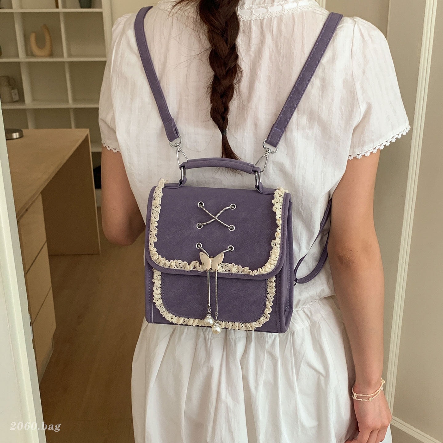 Mochila universitaria diaria versátil temperamento nuevo tipo bolso plegable sensación de mujer 2026 mochila de viaje