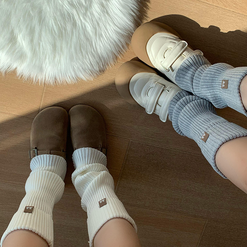 Piles de calcetines de viento de color sólido de otoño y invierno versátil engrosado anillo de calcetines engrosadas calcetines calientes no caen al por mayor