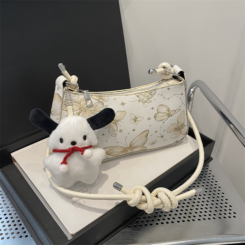 Bolso de diseño de nicho para mujeres 2024 nuevo estilo coreano lindo bolso de brazo portátil para mujeres sensación de alta calidad de una sola mochila de hombro de moda