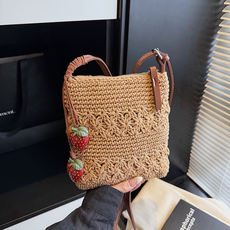 Bolso tejido de moda coreana 2025 verano nuevo bolso femenino bolso de vacaciones junto al mar bolso de mensajero de playa de moda marea