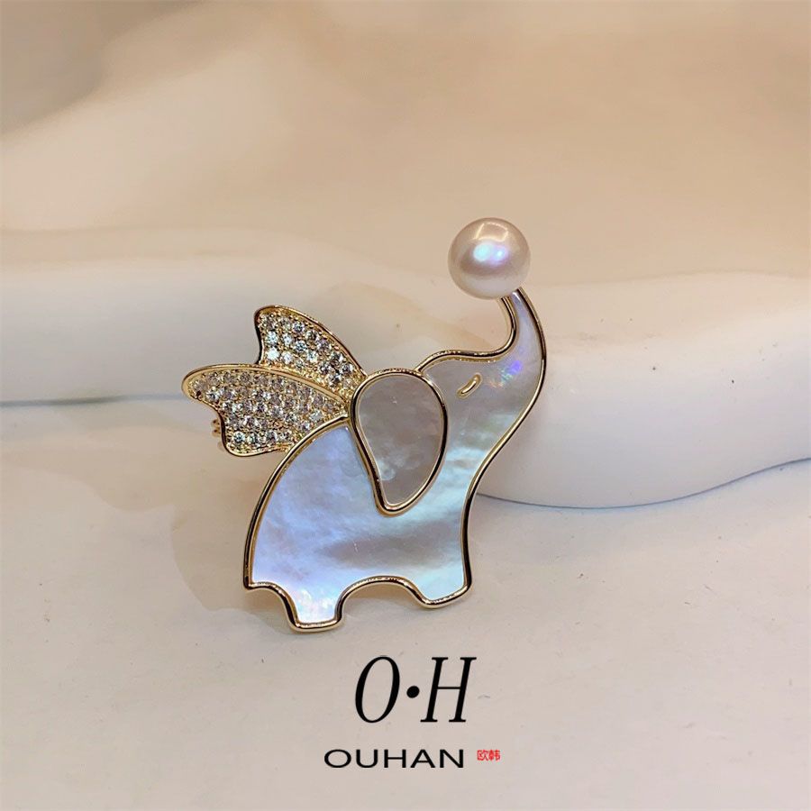 Fritillaria natural Flying elefante broche broche japonesas y coreanas adorables animales broche de ropa accesorios de venta caliente