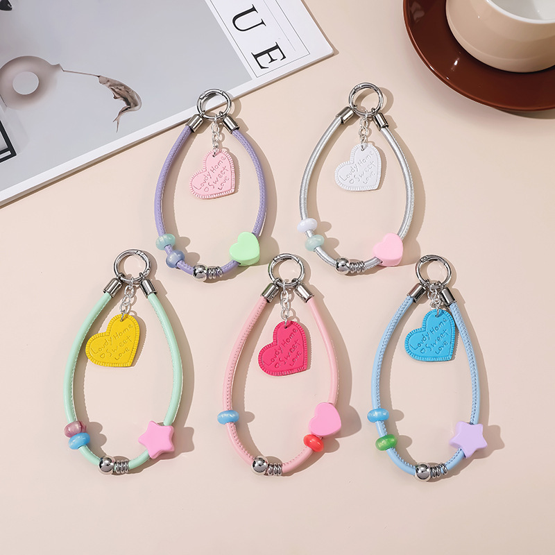 New versatile five-pointed star PU leather cord pendant, heart-shaped keychain, bag and phone decoration, wholesale, in the trendy Instagram style