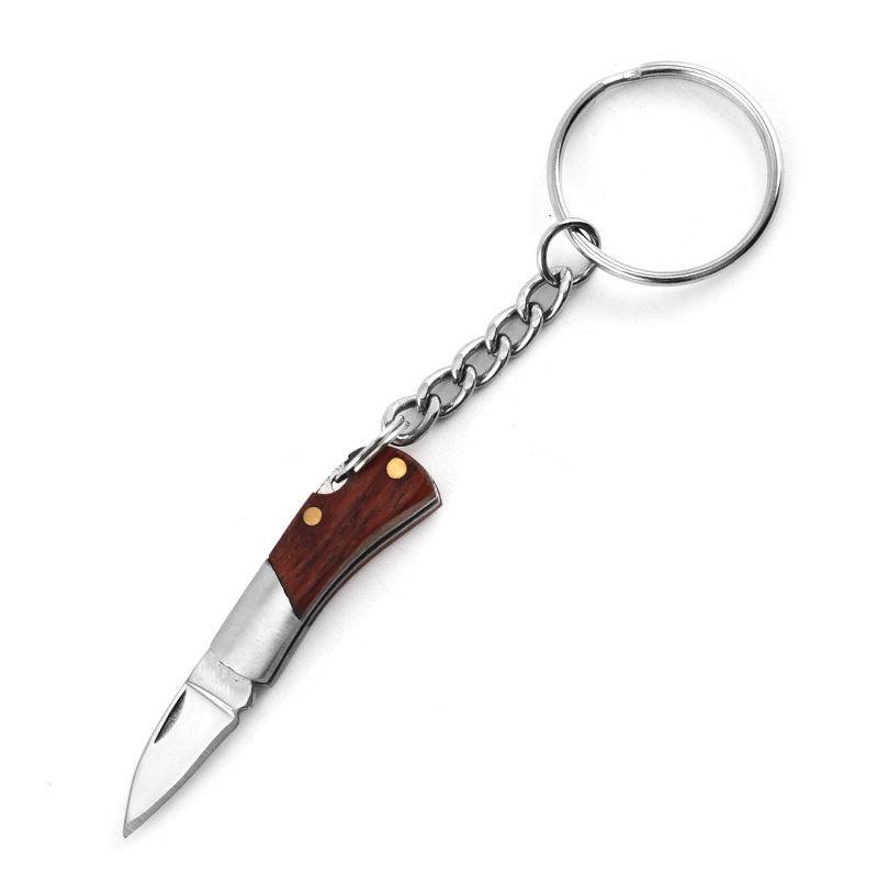 Fábrica directa de bolsillo al aire libre cuchillo plegable cuchillo de frutas portátil expreso mini portable llavero