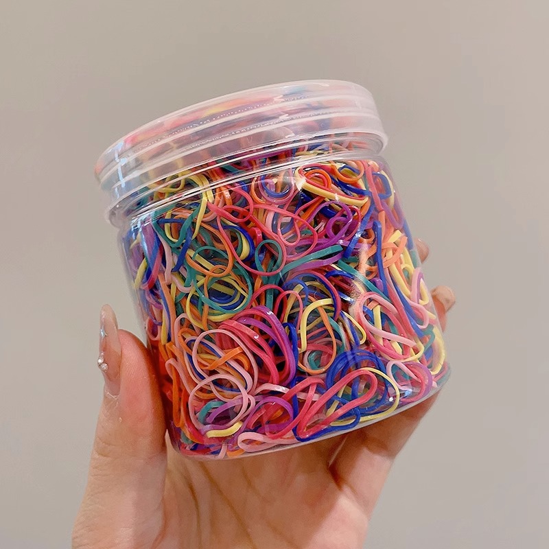 El cabello del bebé está atado, la banda elástica alta, la banda elástica desechable, la trompeta de color para niños no daña el cabello, la banda elástica pequeña