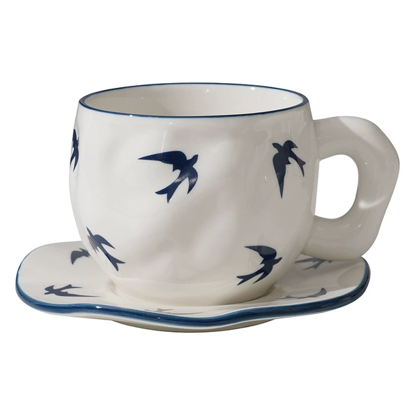 Swallow cup + saucer
