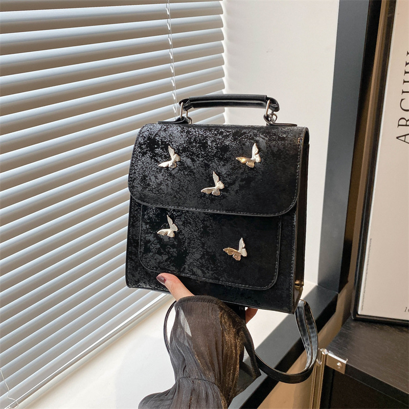 Mochila de mujer casual de estilo exterior versátil 2024 verano nuevo viaje de alta calidad mariposa mini mochila