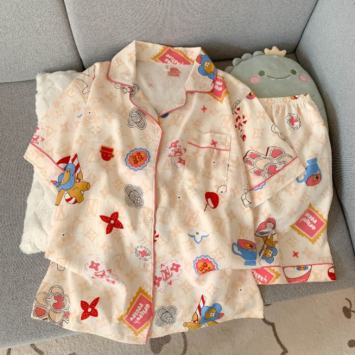Pijamas de algodón de nube al por mayor transfronterizo para mujer nueva rebeca de verano solapa pantalones cortos de manga corta traje de servicio a domicilio dulce y lindo