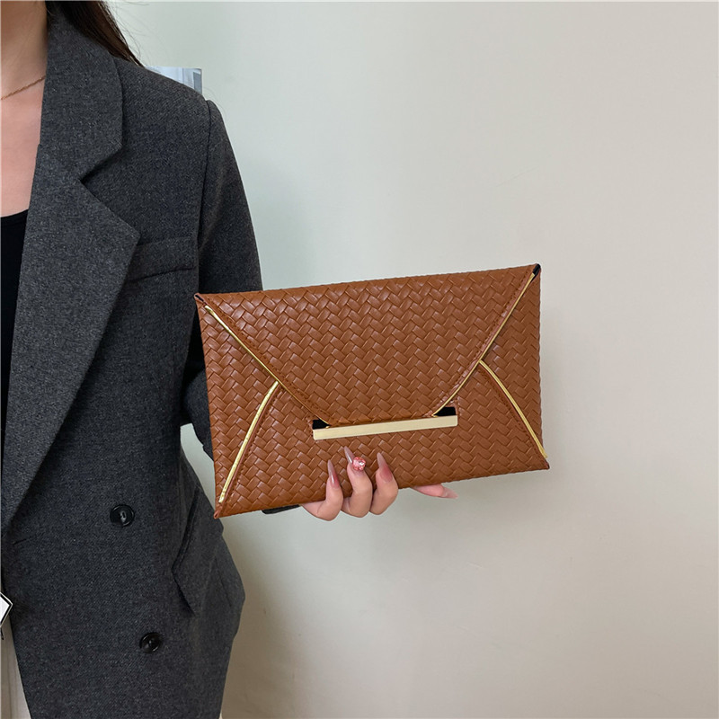 Simple color sólido popular de alto rendimiento sobre de sensación de mujer cena temperamento ligero lujoso moda bolsa de mano casual