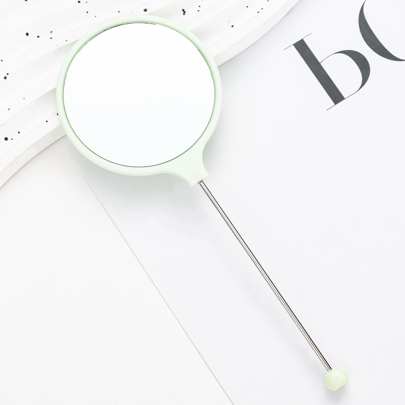 Espejo de maquillaje redondo portátil de alta definición, maquillaje portátil, mini manejo, espejo al por mayor.