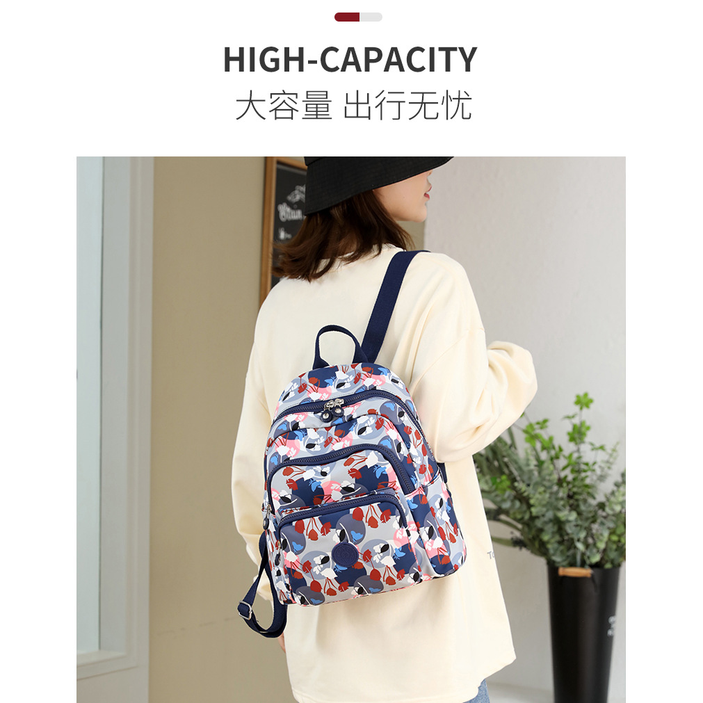 Las nuevas señoras mochila fresca Oxford tela de gran capacidad mochila simple moda ocio luz viaje bolsa generación