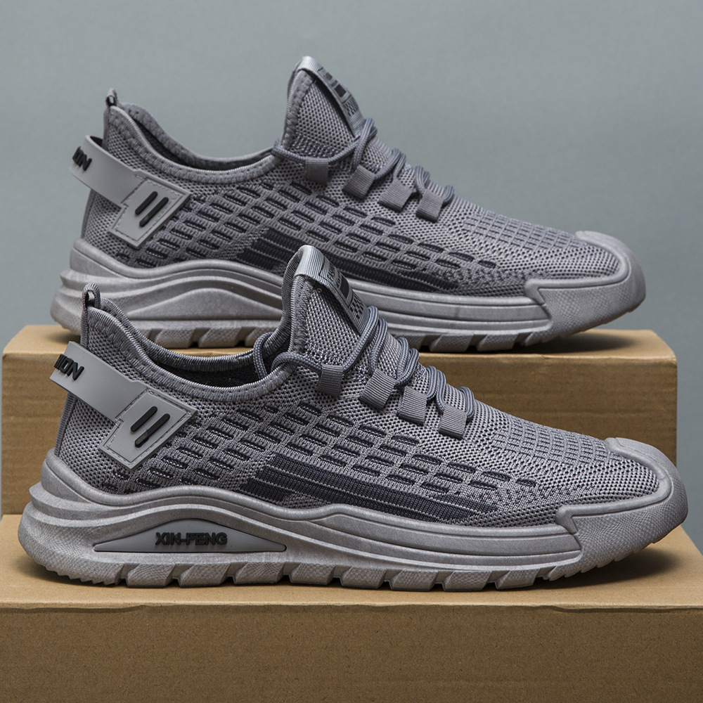 Zapatos de malla para hombre otoño nuevo estilo de moda zapatos casuales zapatos casuales al aire libre para jóvenes zapatos deportivos tejidos voladores al por mayor